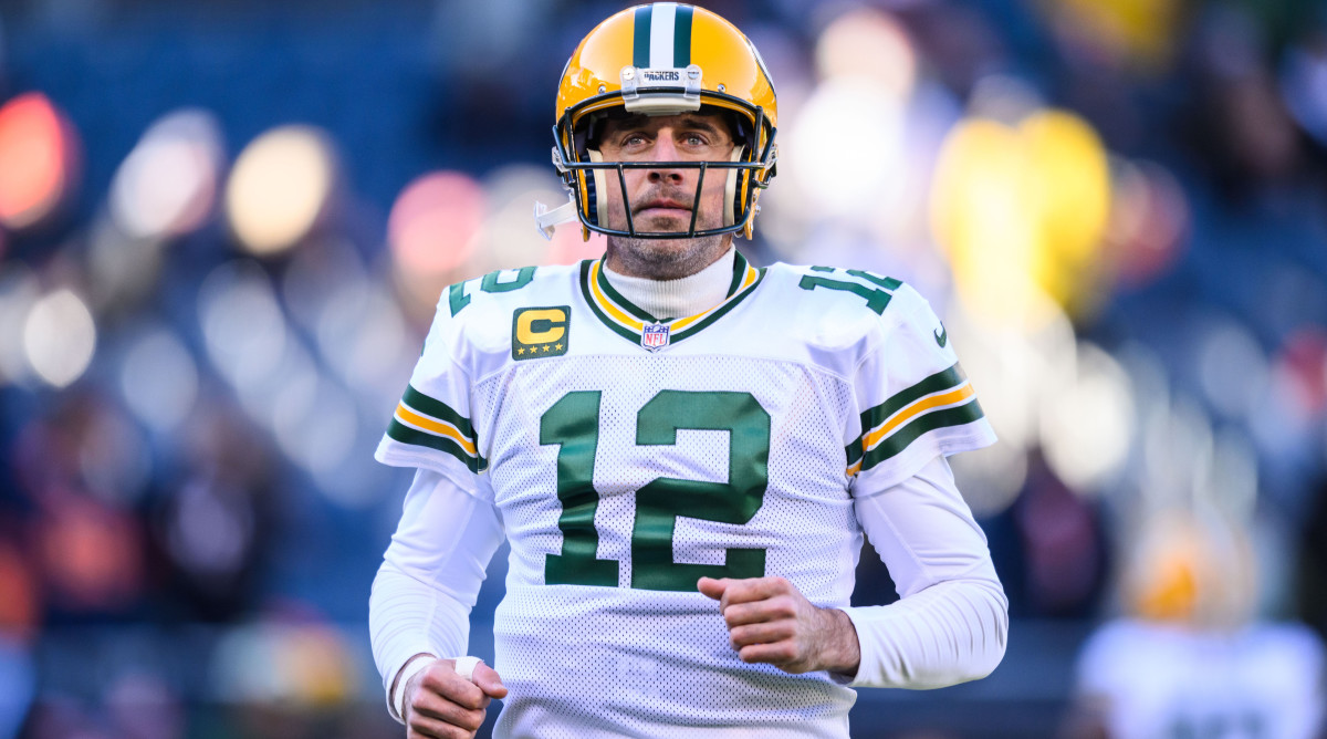 Aaron Rodgers runs